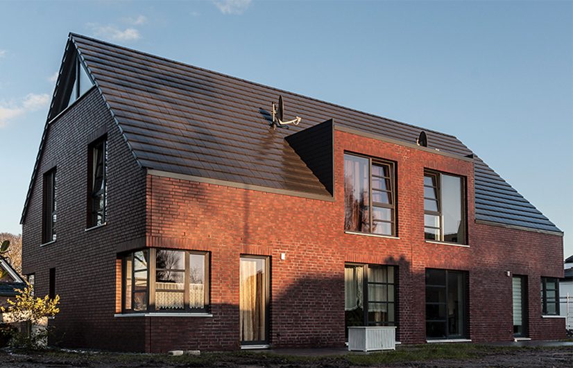 Visualisierung eines Doppelhauses mit roter Klinkerfassade